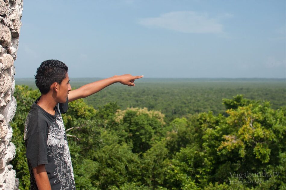 Germán pointing toward Chetumal on the horizon.